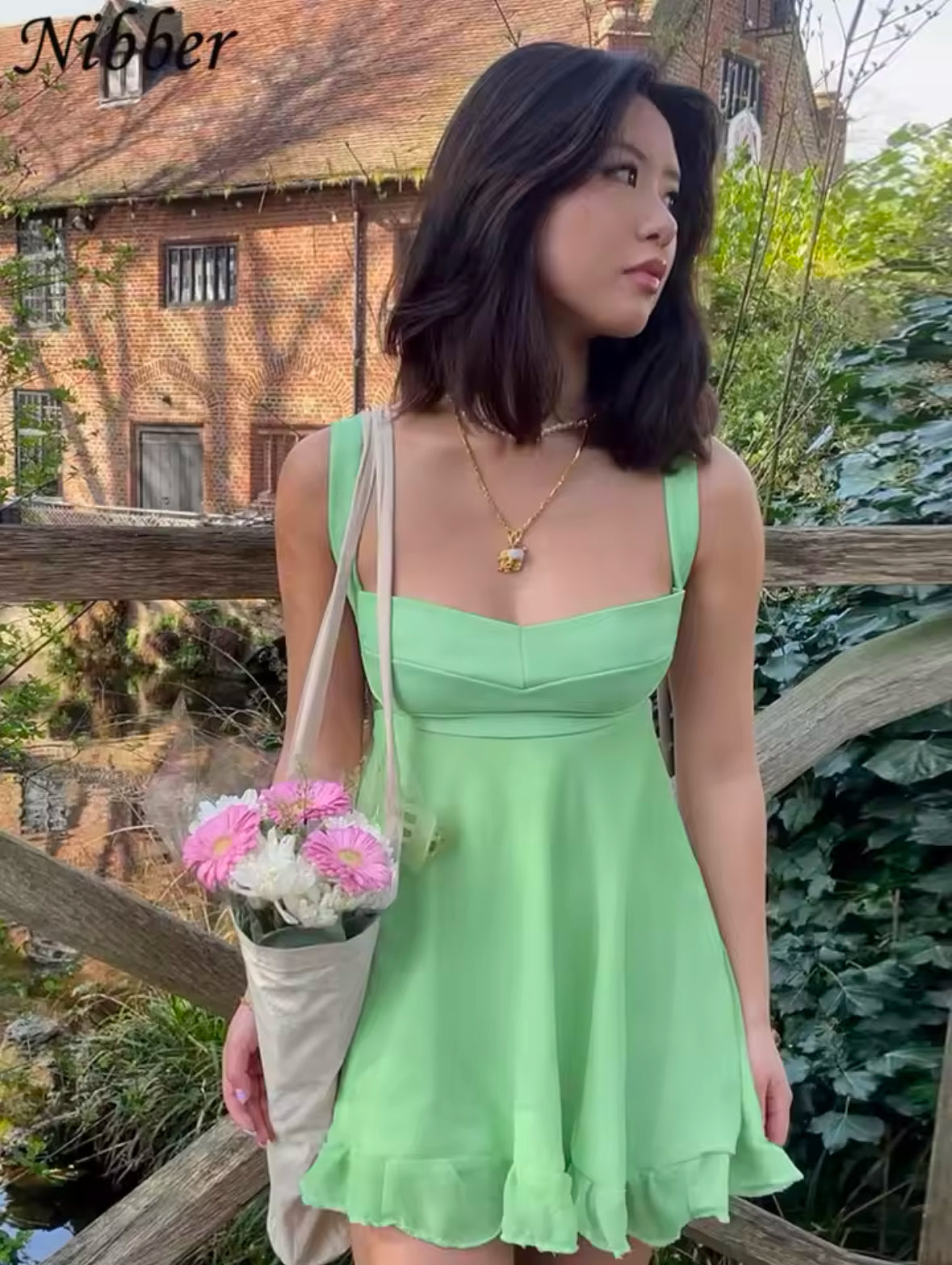Nibber Elegant Slim Cutout Dress for Women – Sexy Backless Ruffle Sling Dress in Solid Color 2025
