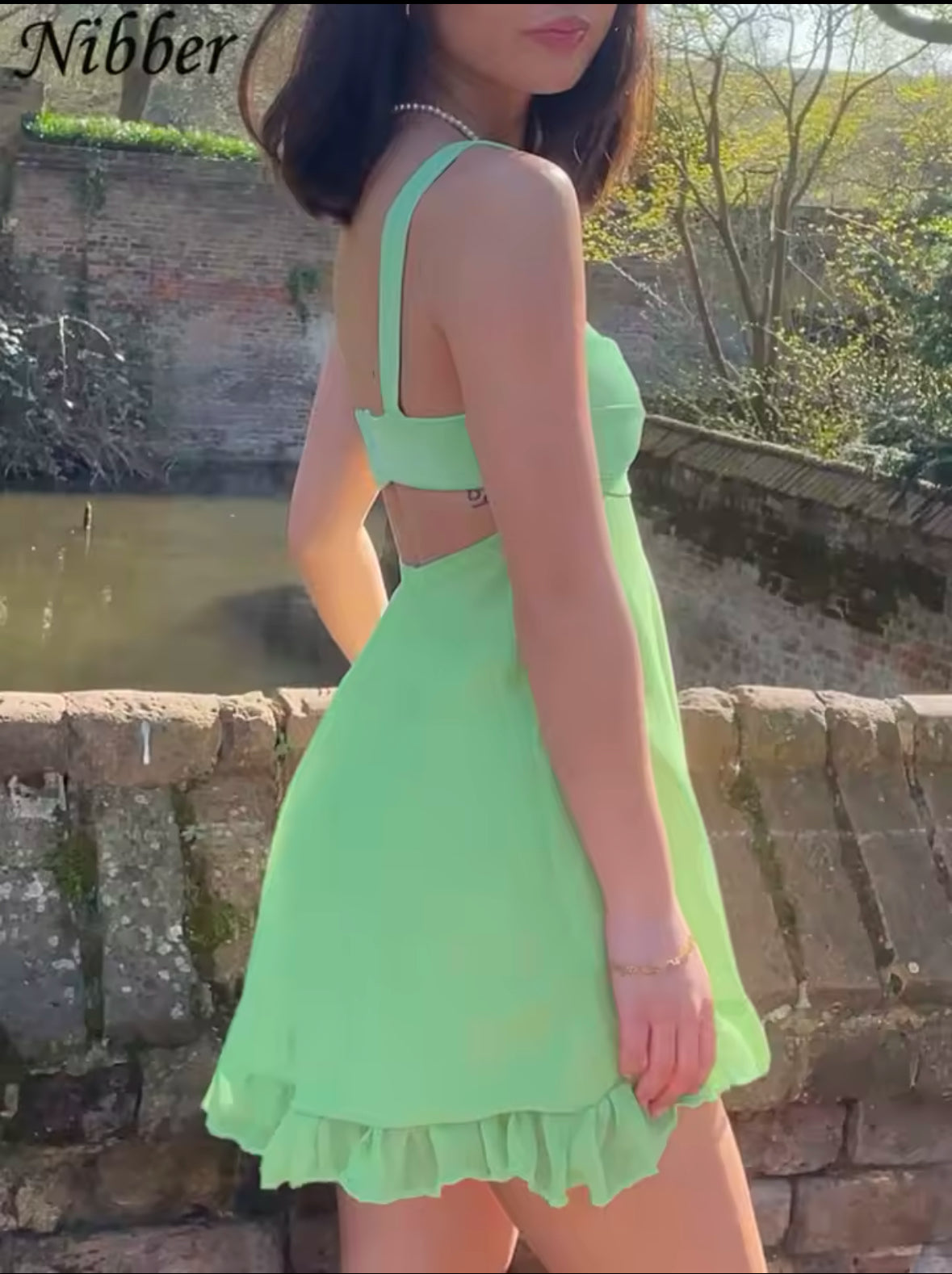 Nibber Elegant Slim Cutout Dress for Women – Sexy Backless Ruffle Sling Dress in Solid Color 2025